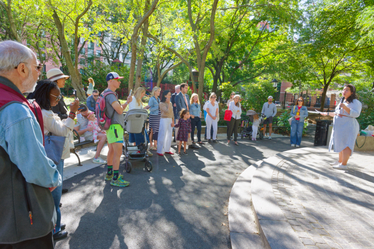 Tricia Shimamura, the Parks Department’s Manhattan Borough Commissioner, speaks at the Washington Market Park celebration. After describing the repair work that had been completed, she added, “I really want to see a whole playground reconstruction eventually.” Photo: Carl Glassman/Tribeca Trib